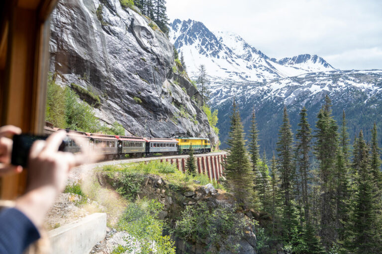 White Pass Summit Railroad train traveling through the Alaskan mountains near Skagway