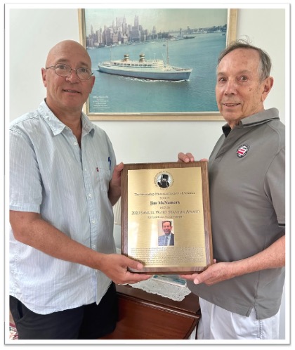 Captain James McNamara receives the 2020 Samuel Ward Stanton Award for Lifetime Achievement Award from Matthew Shulte, Executive Director and CEO of the Steamship Historical Society of America. From the William H. Miller collection.