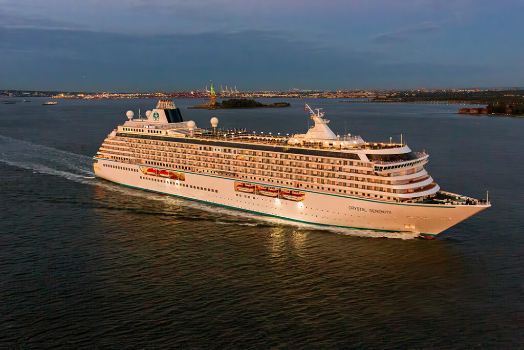 Crystal Serenity cruising into New York Harbor. Image courtesy of Crystal Cruises.