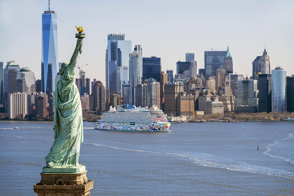 Norwegian Aqua sailing past the Statue of Liberty on her maiden call at New York City.