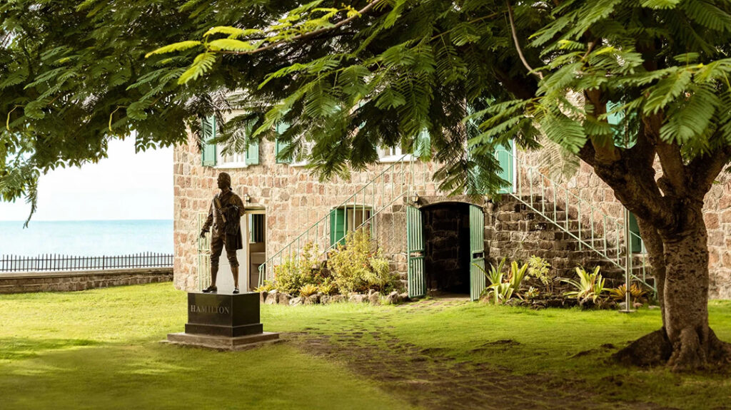 The Hamilton Museum in Charlestown, Nevis, birthplace of Alexander Hamilton, overlooks the Caribbean Sea, preserving the legacy of one of America’s Founding Fathers in this restored 18th-century stone building. Image courtesy of Nevis Tourism Authority.