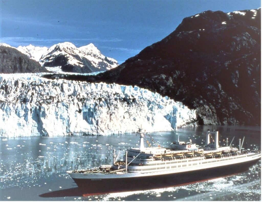 Holland America’s SS Rotterdam takes in the icy grandeur of Margerie Glacier in Glacier Bay. From the William H. Miller collection.