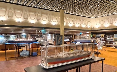 A model of the Statendam is displayed aboard the preserved SS Rotterdam during Holland America Line’s “The Big Three” exhibition. Photo credit: Jan Willem Goudriaan.