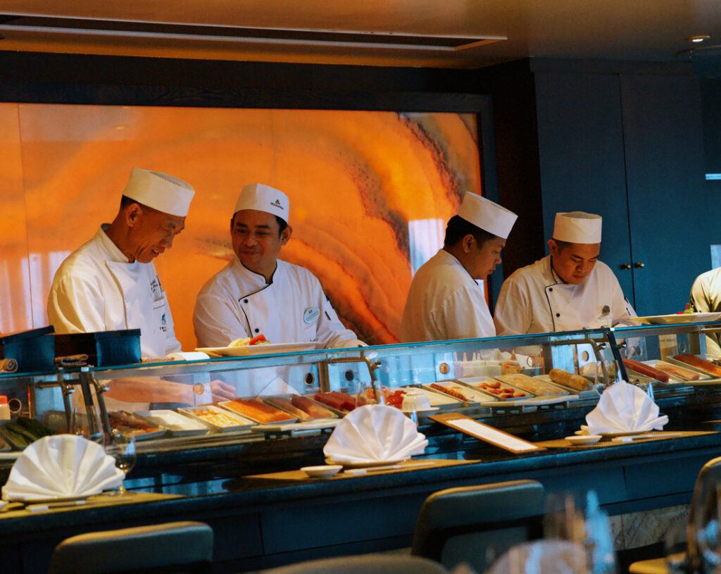 Umi Uma sushi chefs working at the only Nobu restaurant at sea