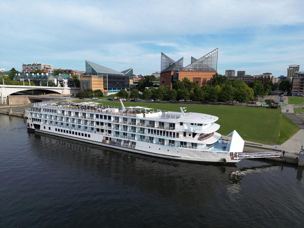 American Cruise Lines’ modern riverboat American Serenade docked in Chattanooga, Tennessee, along the Tennessee River during its inaugural Mississippi–Tennessee voyage. Image courtesy of American Cruise Lines.