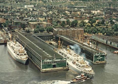 A busy day at Holland-America Line’s Hoboken piers, where multiple liners berth side by side in the 1950s. From the William H. Miller collection.