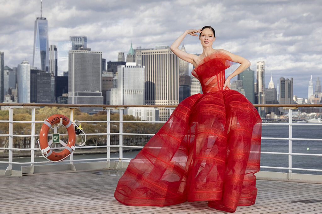 Coco Rocha wears a signature Christian Siriano design aboard Queen Mary 2 for Cunard's Transatlantic Fashion Week. Picture by Christopher Ison.