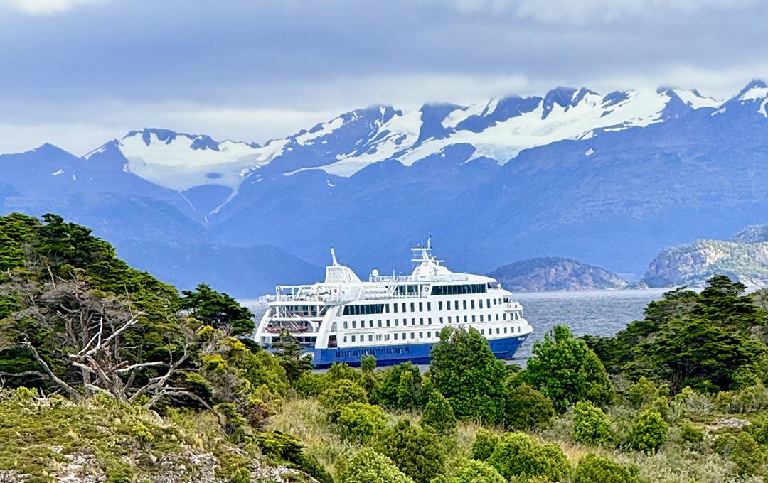 After exploring Patagonia ashore, it’s a comforting sight to see Stella Australis waiting in the fjord. Photo: Monte Mathews.