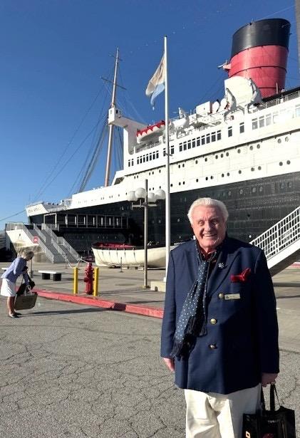 Bill Miller visits the original Queen Mary in Long Beach during Queen Mary 2’s historic world voyage. Courtesy of the William H. Miller Collection