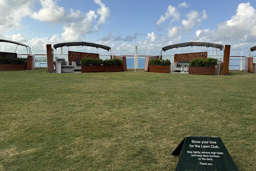 The Lawn Club on Celebrity Reflection, where real grass and cabanas create one of the ship’s most distinctive outdoor spaces. Credit: H. Liu