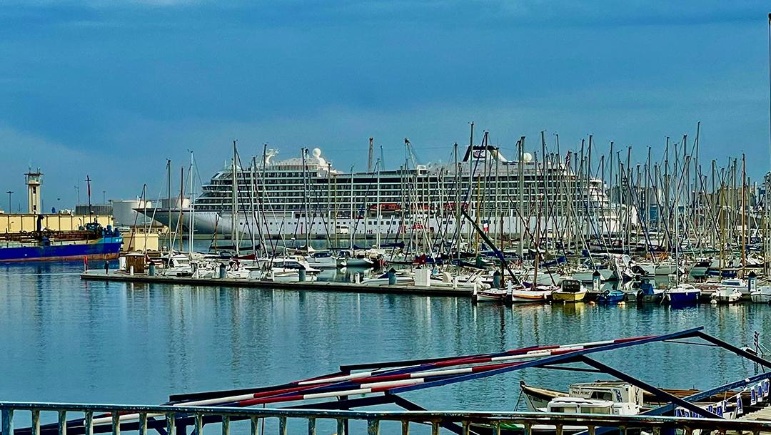 Viking Jupiter towers beyond the marina in Sète, France. Photo: Monte Mathews.