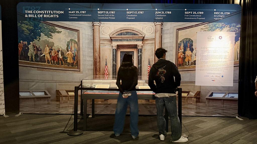 Visitors view the Constitution and Bill of Rights section of the Freedom Plane National Tour at the Museum of Miami. Photo: H. Liu