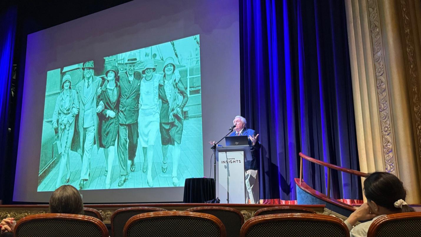 Maritime Historian and Lecturer William H. Miller gives one of his talks aboard Queen Mary 2. Image: William H. Miller.