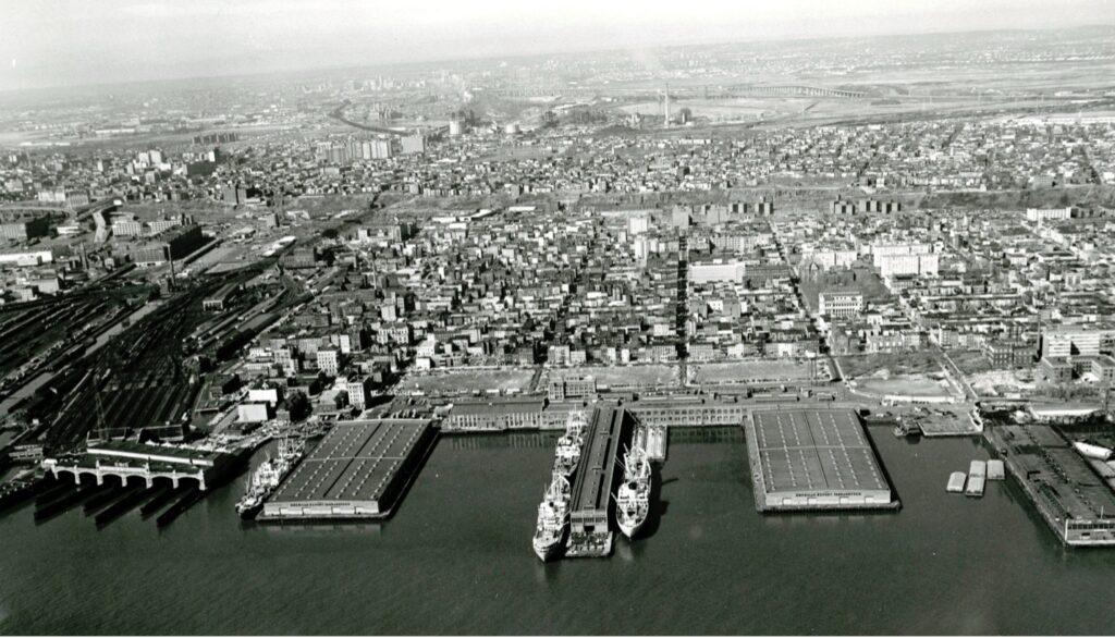 Hoboken’s working waterfront in 1971, with passenger piers, ships and rail yards lining the Hudson River. From the William H. Miller Collection.