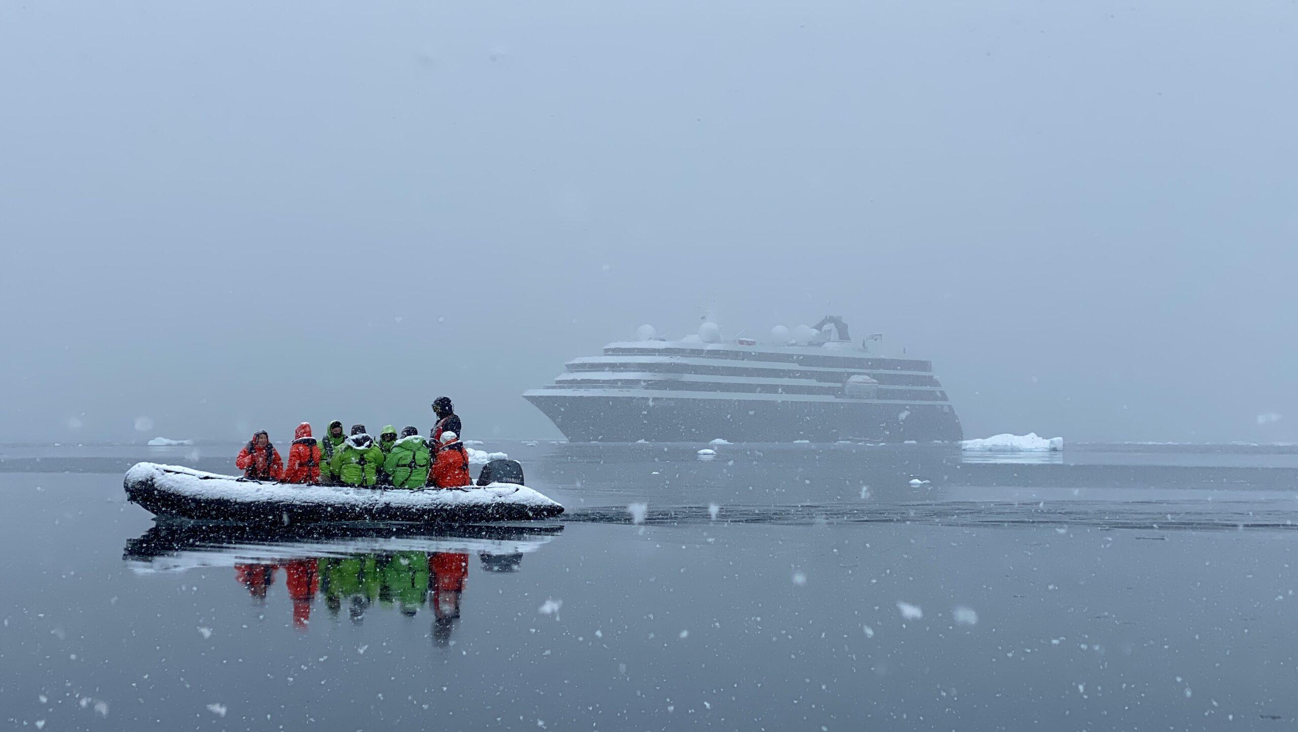 Passengers of World Navigator travel in a zodiac for a landing on the Antarctic Peninsula. Photo: H. Liu