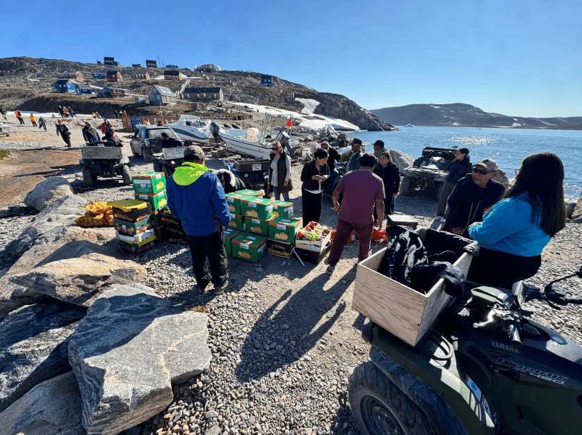 Fresh produce donated by Seabourn Venture is distributed in Ittoqqortoormiit. Credit: Seabourn.