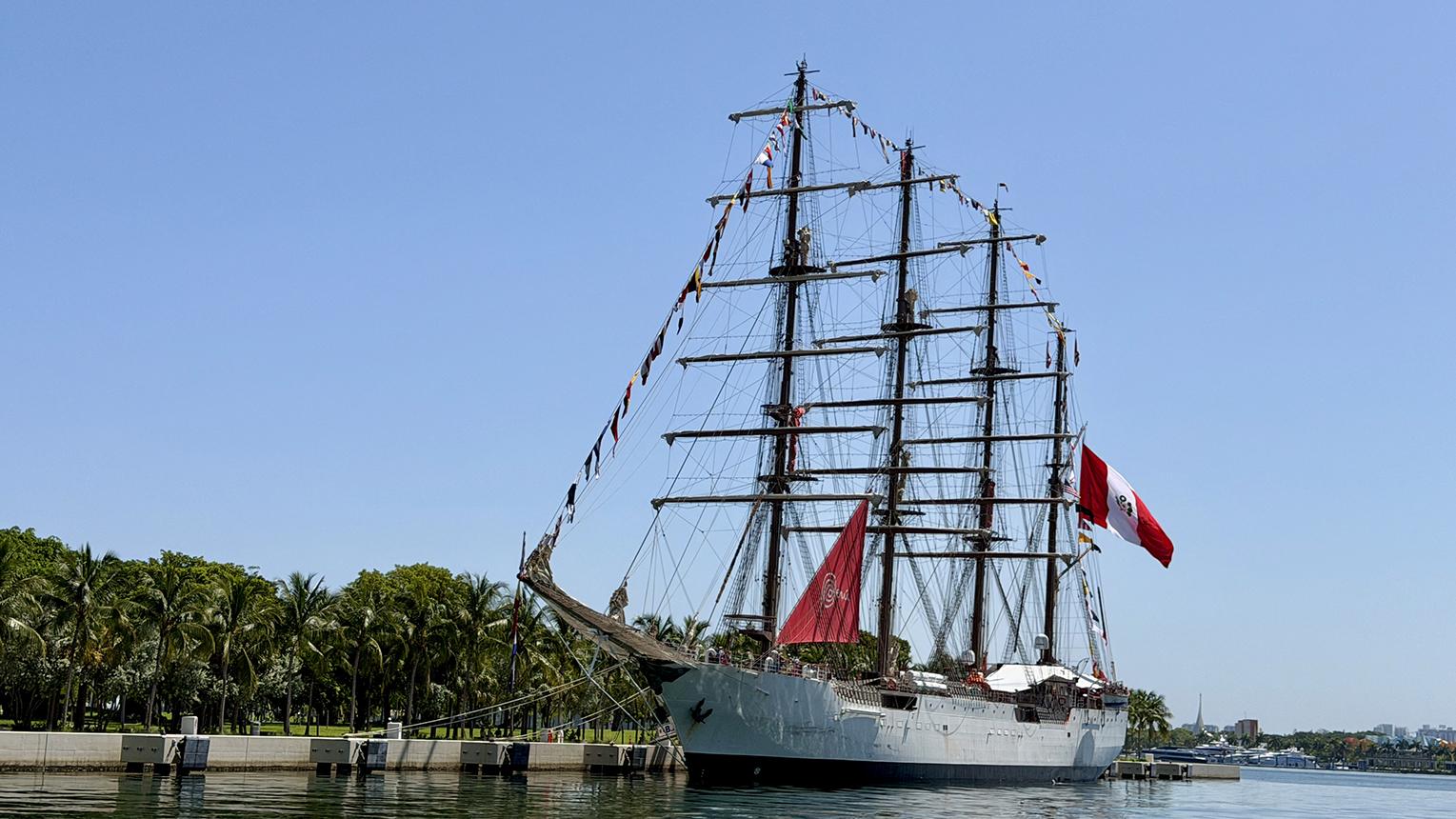 B.A.P. Unión displays the Peruvian flag and a red Marca Perú sail while docked at Maurice A. Ferré Park in downtown Miami. Photo: H. Liu