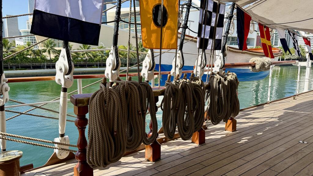 Coiled lines, wooden belaying pins and blocks form part of B.A.P. Unión’s traditional sailing rigging. Photo: H. Liu