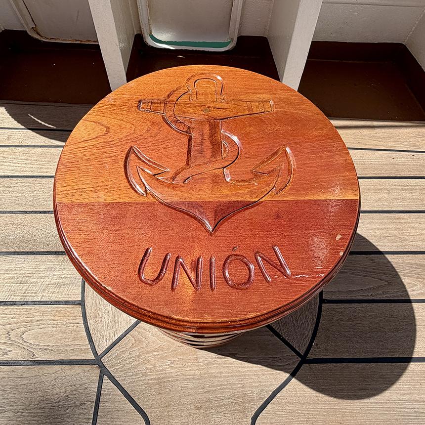A wooden deck fitting aboard B.A.P. Unión is carved with an anchor and the ship’s name. Photo: H. Liu