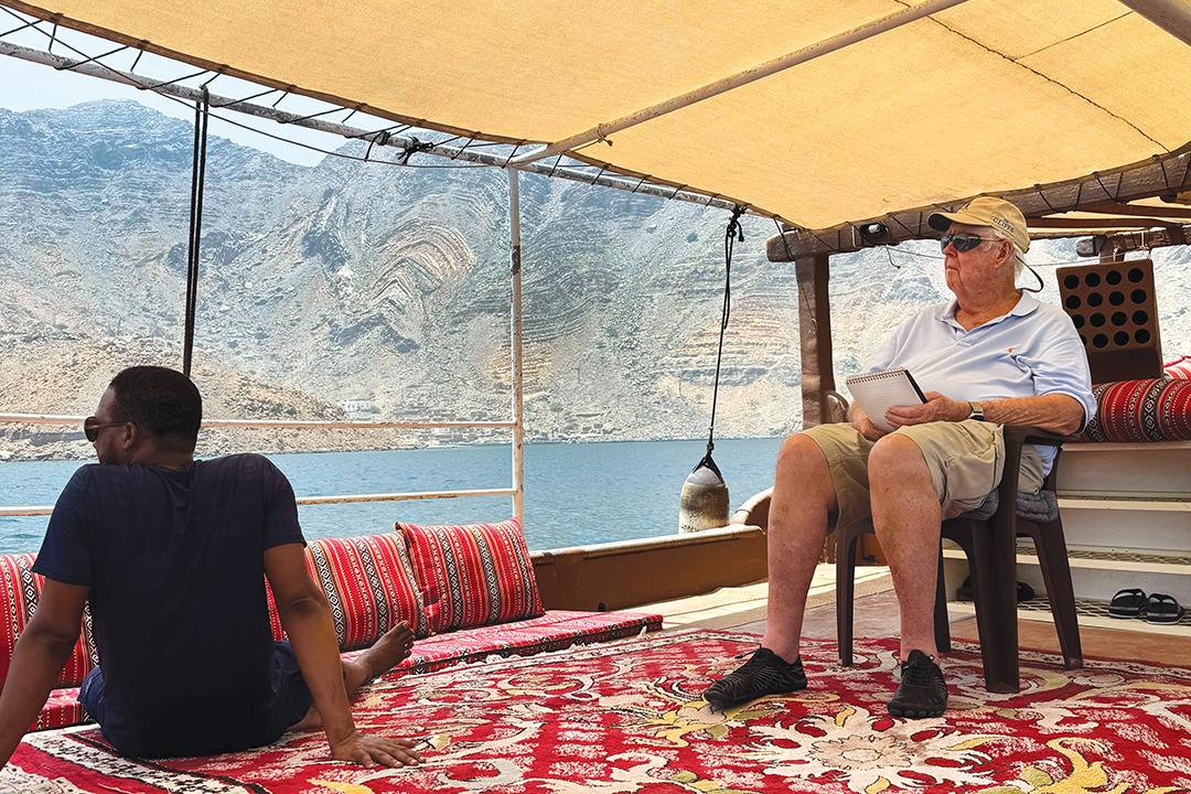 Milton Benjamin and an Omani guide aboard a traditional dhow in the Strait of Hormuz. Photo: Milton Benjamin.