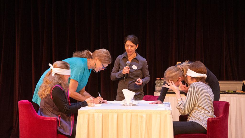 Dalila Roglieri leads blindfolded passengers during Crystal’s Blind Tasting Experience. Credit: Crystal Cruises