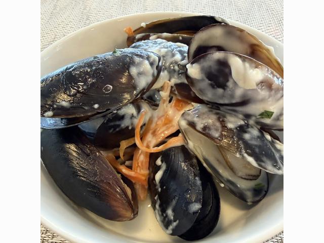 Mussels are served during The Yacht Club’s France-themed buffet lunch as Scenic Eclipse II calls at Honfleur. Photo: Judi Cuervo