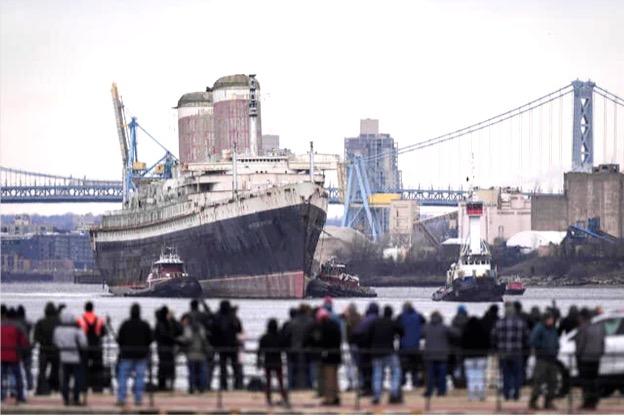 The United States leaves Philadelphia under tow for Mobile, watched by crowds along the Delaware River. Courtesy of the William H. Miller Collection.